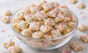 Easy Cake Batter Puppy Chow with White Chocolate & Sprinkles Recipe